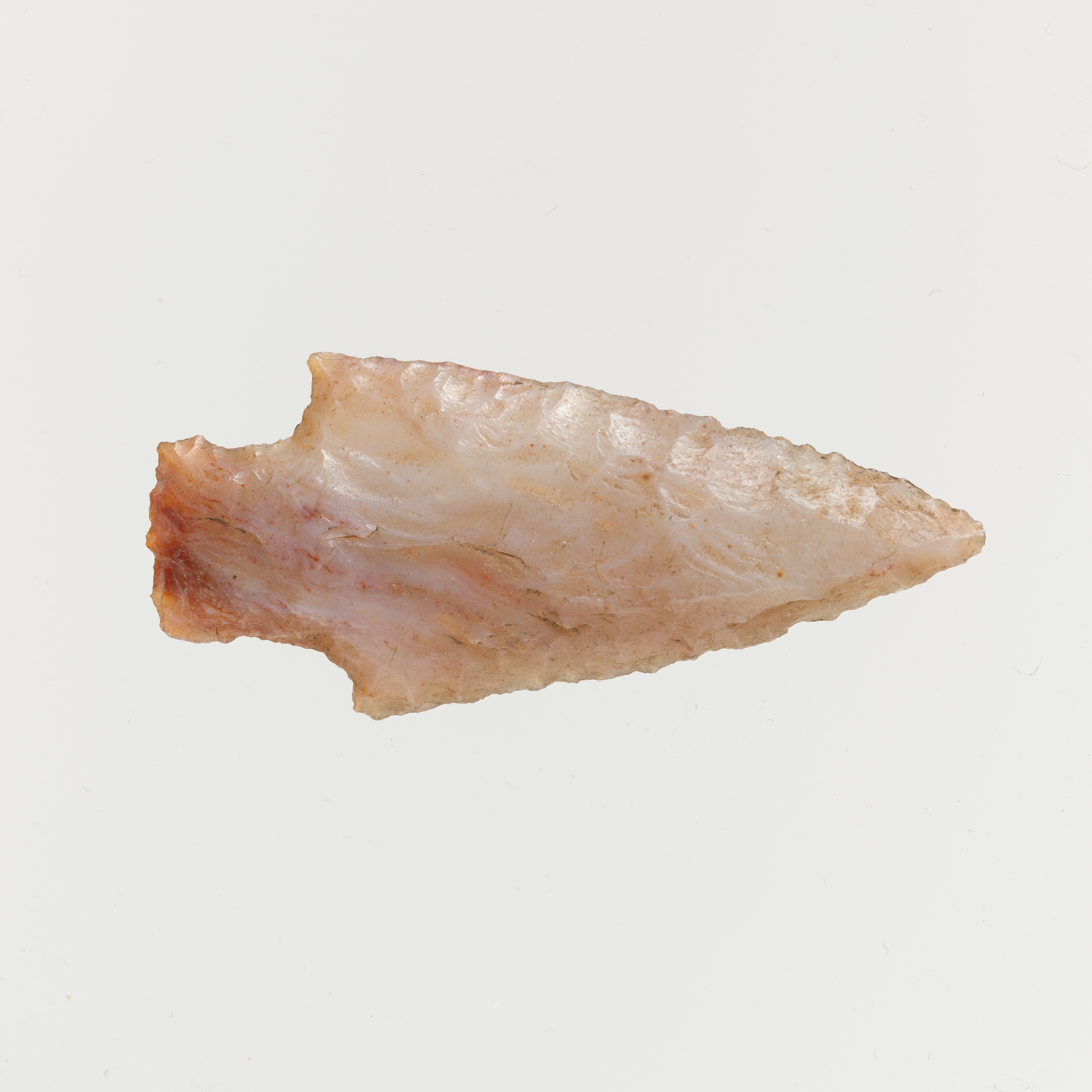 Ancient flint arrowhead associated with Crete
